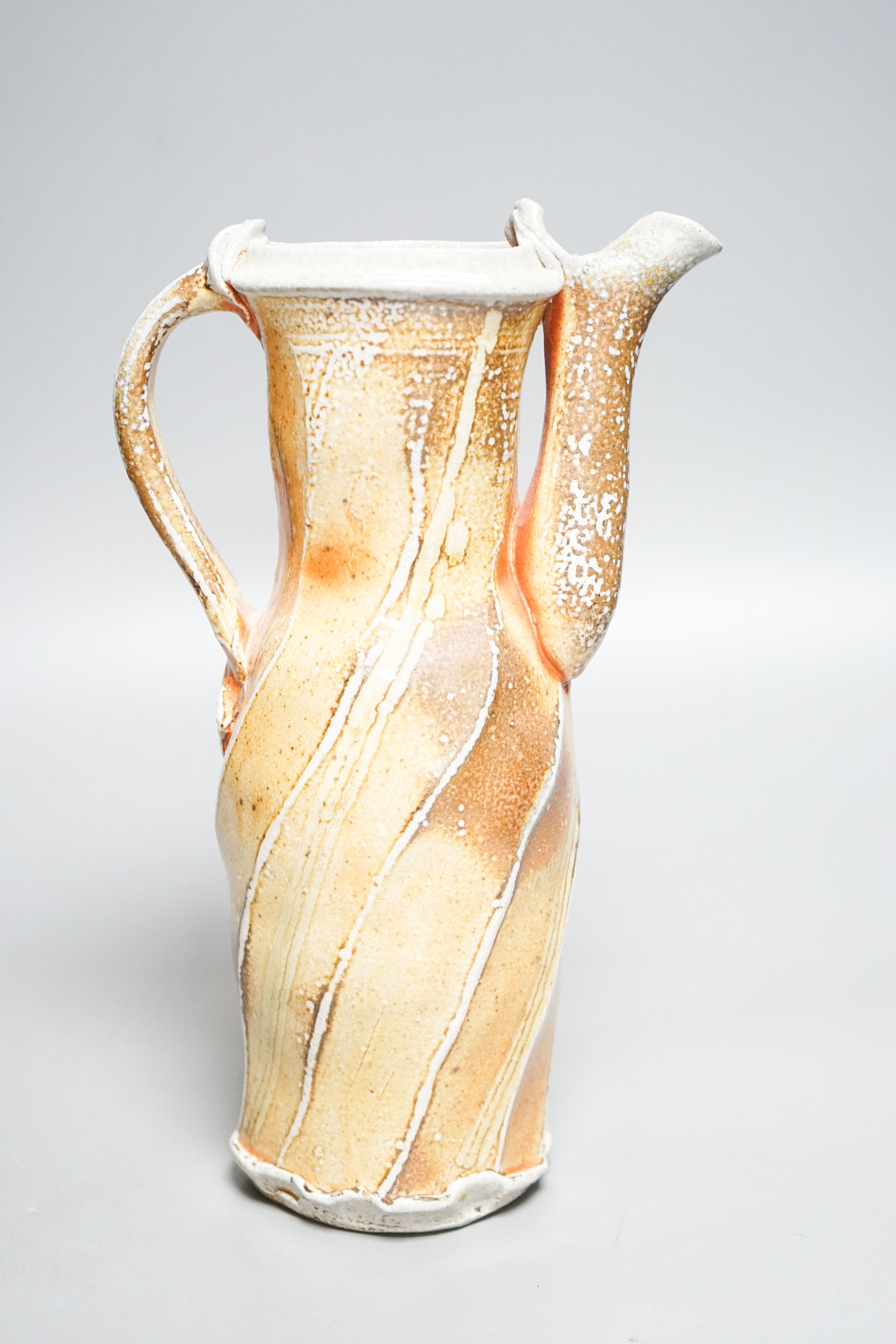 Ruthanne Tudball (b.1948), a soda fired stoneware spouted ewer 28cm